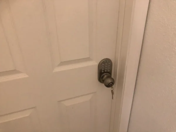 A door with the handle locked to it.