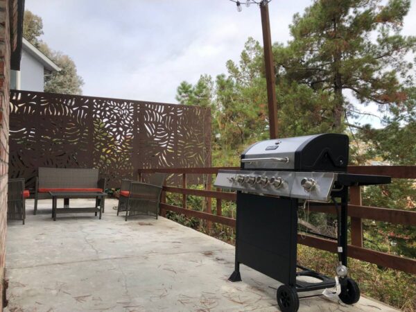 A grill on the patio of an outdoor restaurant.