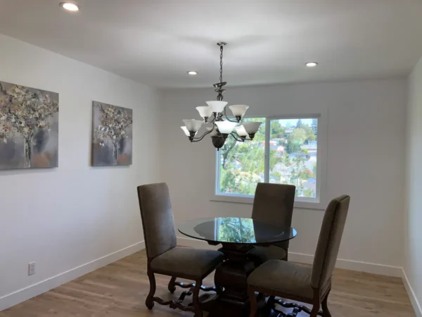 A dining room with chairs and a table