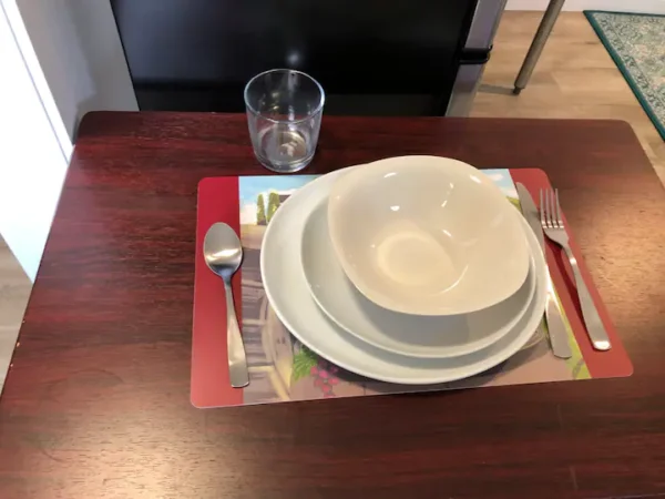 A table with plates and bowls on it