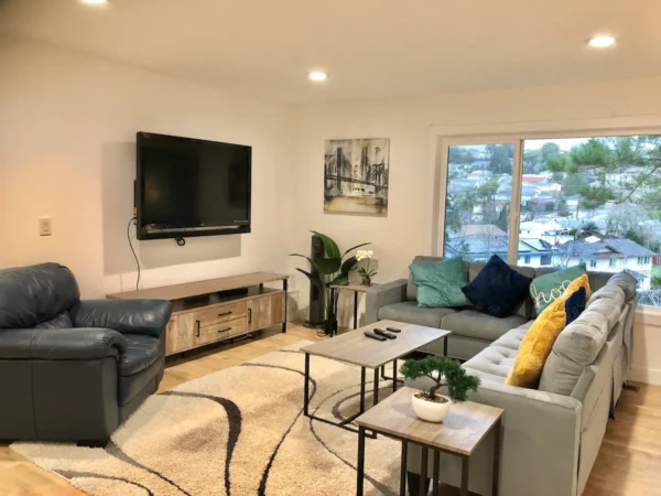 A living room with couches and tables in it