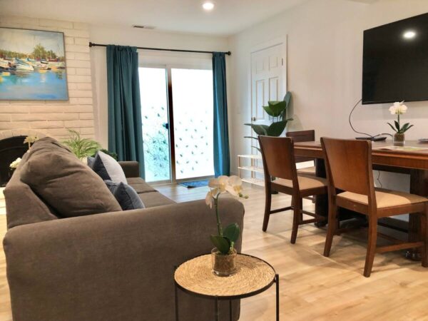 A living room with a couch and table in it