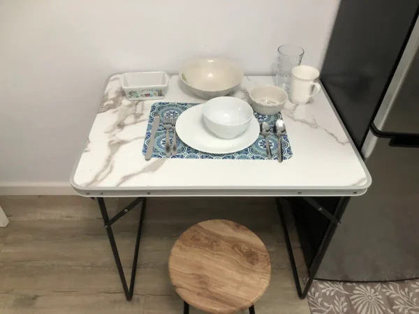 A table with bowls and plates on it